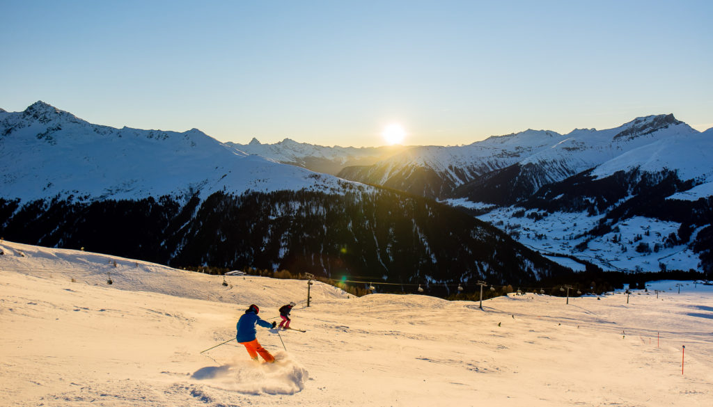 Last ride into Davos with the sunset over the alps.